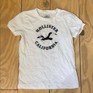 White Hollister t-shirt.